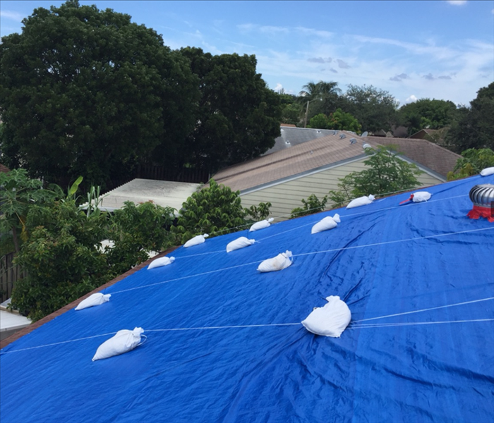 Tarp on a residential roof